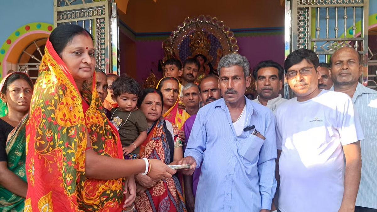 Village 'Lakshmis' donate a month's 'Lokkhi’r Bhandar' funds for Durga temple construction