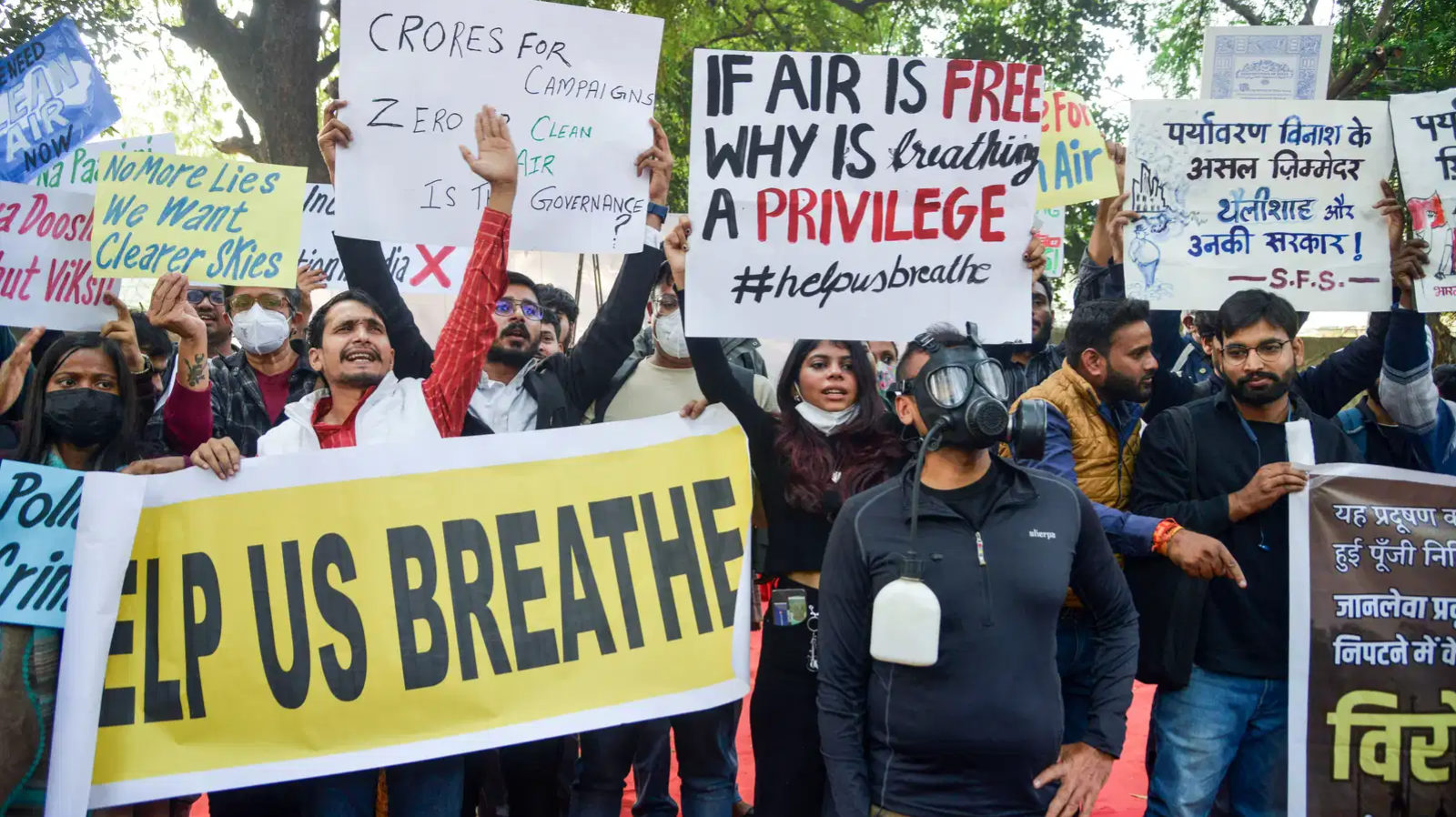‘Let Us Breathe’: Delhi hits streets with masks, oxygen cylinders to protest choking air
