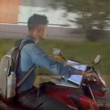 'Work from bike' video from Hyderabad sparks road safety debate