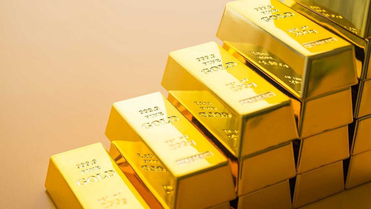 Gold hits record high, price crosses $5,000 as investors seek safety