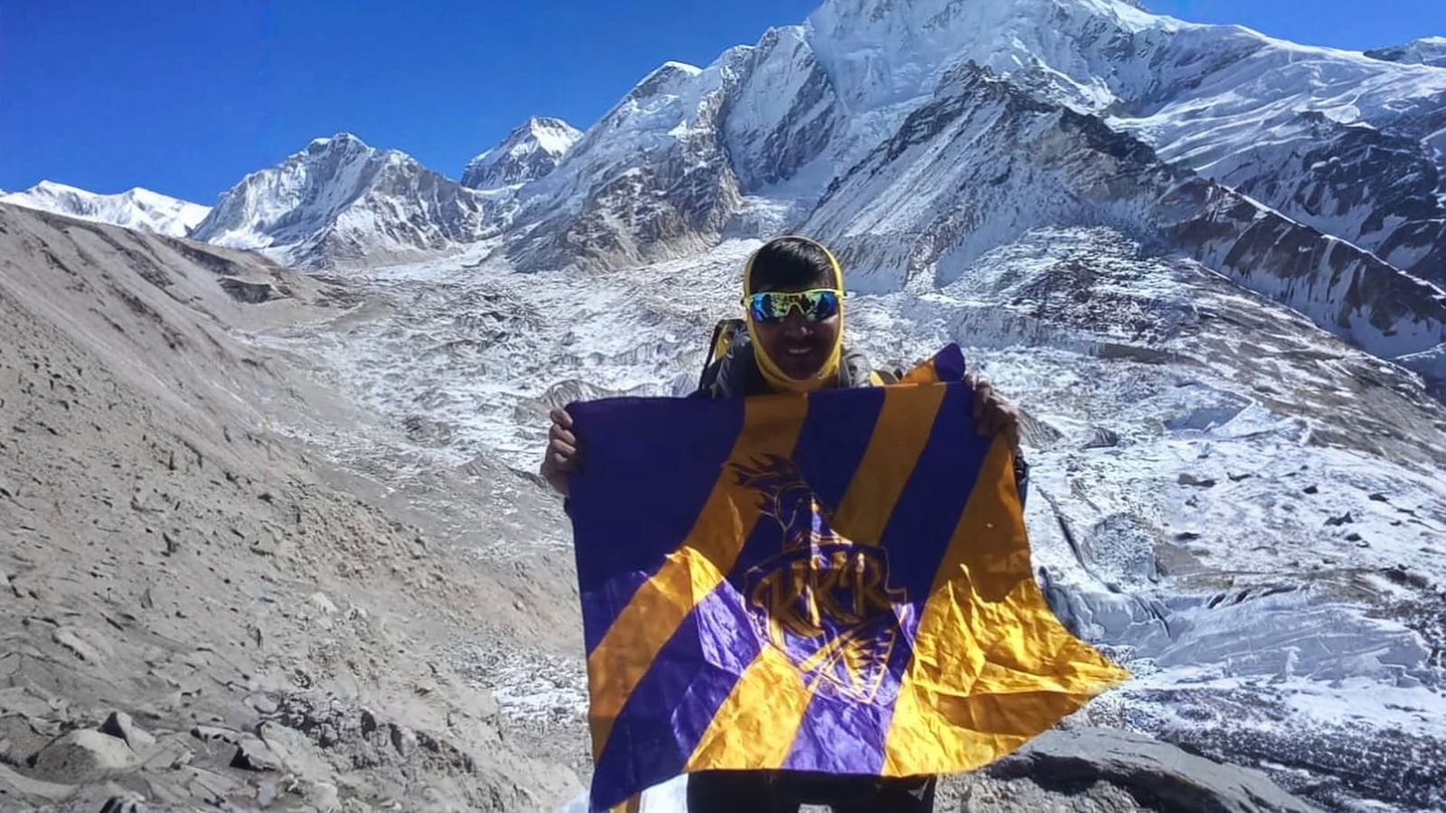 KKR superfan Ashok Chakraborty hoists team flag at Everest base camp