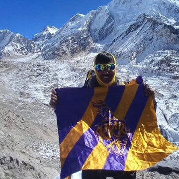 KKR superfan Ashok Chakraborty hoists team flag at Everest base camp