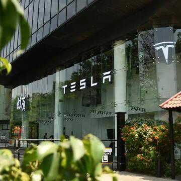 Tesla opens experience centre in Bengaluru’s Whitefield, showcases Model Y and Model Y L SUVs