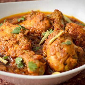 Tired of regular chicken curry? Try this festive Hyderabadi red chicken recipe