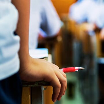 Father couldn't pay fees, son made to sit on classroom floor for exam