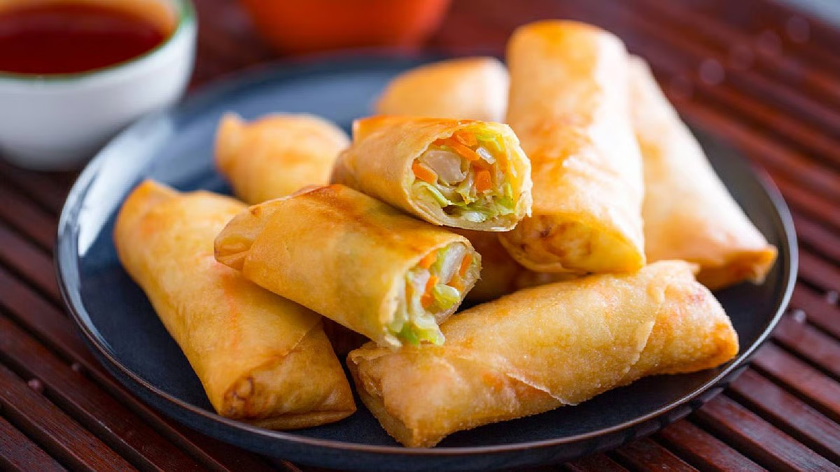 Craving a snack? Make yummy spring rolls with cheese and spinach at home