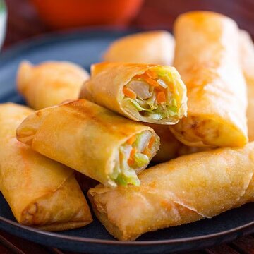 Craving a snack? Make yummy spring rolls with cheese and spinach at home