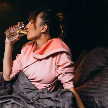 Is drinking water before bed good or bad? Here’s what experts say