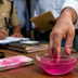 What is the pink bottle used in anti-bribery raids? Know the science behind it