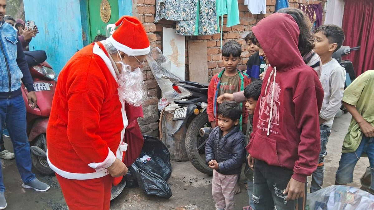 Rural Development Minister turns Santa Claus to spread christmas cheer among children