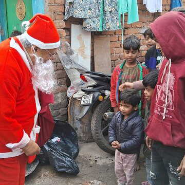 Rural Development Minister turns Santa Claus to spread christmas cheer among children