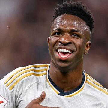 Vinícius double keeps Real Madrid’s title hopes alive