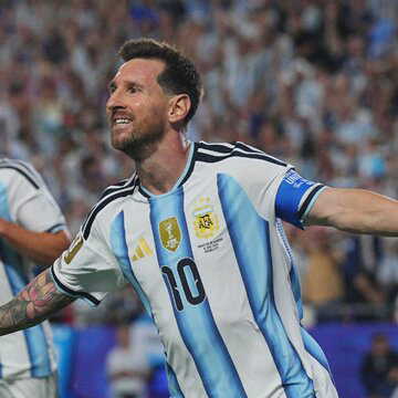 Messi scores first World Cup hat-trick to shoot Argentina past Algeria