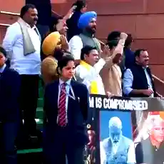 Lok Sabha adjourned till 12 pm amid Opposition protests, suspended MPs protest outside Parliament