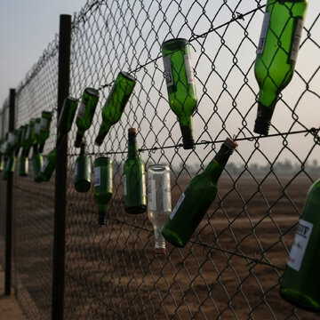 Why are empty glass bottles hanging along the India-Pakistan border? Here’s the hidden reason