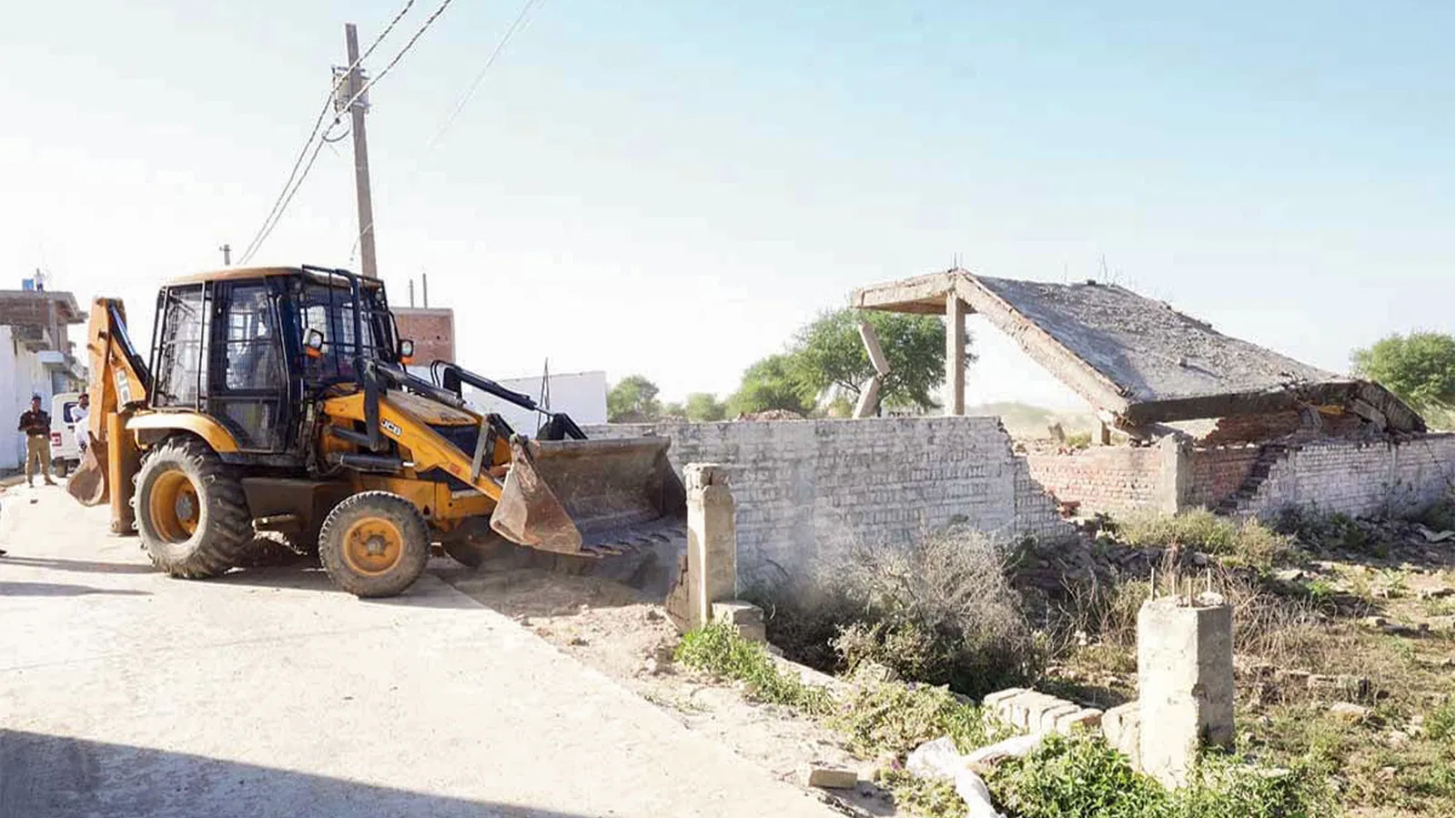 Bulldozer used for demolition of illegal mosque in Sambhal