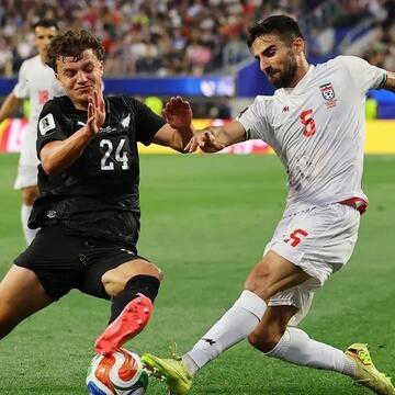 Iran battle back twice to deny New Zealand famous victory in emotionally charged World Cup opener