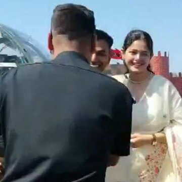 Army takes note after officer's proposal beside helicopter captures internet